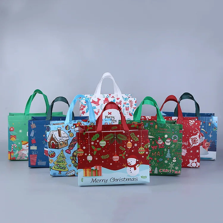 10PC New in Christmas Gift Bags Cartoon Cute Print Santa Elk Snowman Printing Non Woven Foldable Storage Handbag Party Supplies