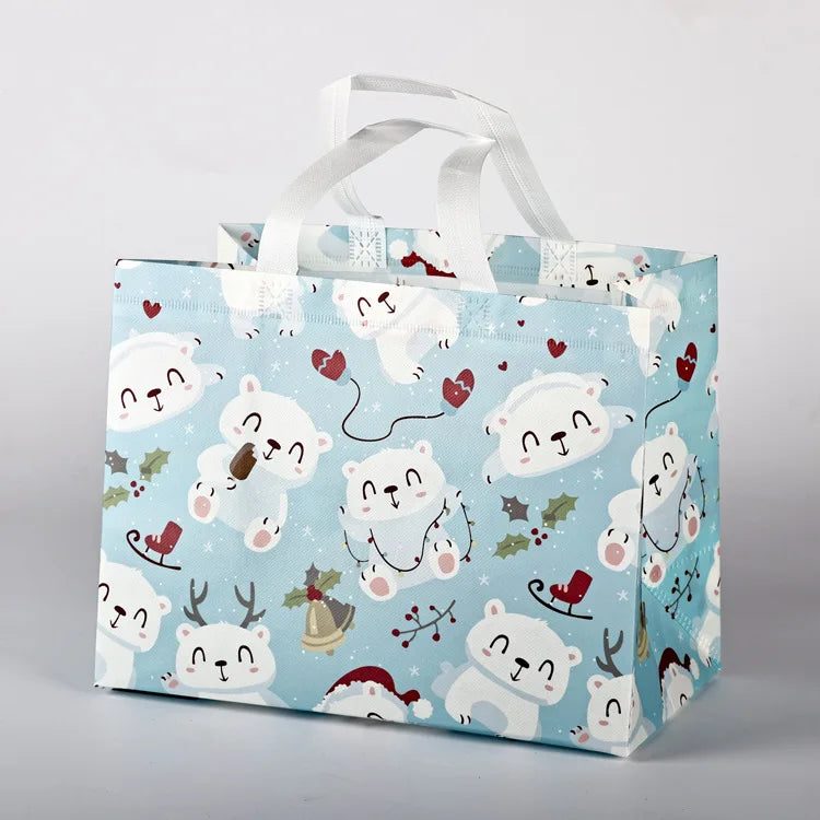 10PC New in Christmas Gift Bags Cartoon Cute Print Santa Elk Snowman Printing Non Woven Foldable Storage Handbag Party Supplies