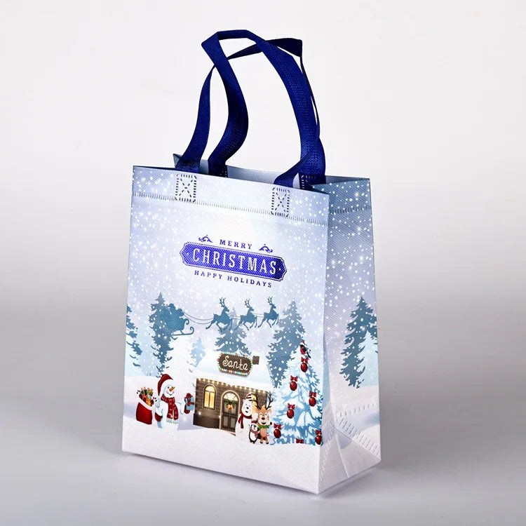 10PC New in Christmas Gift Bags Cartoon Cute Print Santa Elk Snowman Printing Non Woven Foldable Storage Handbag Party Supplies
