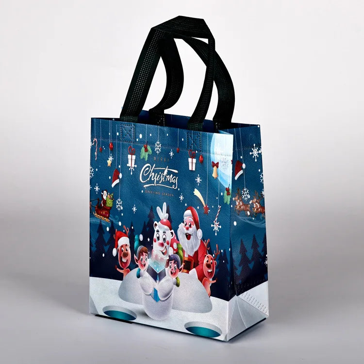 10PC New in Christmas Gift Bags Cartoon Cute Print Santa Elk Snowman Printing Non Woven Foldable Storage Handbag Party Supplies